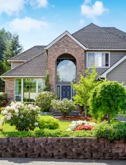 house with nice front yard and shrubs